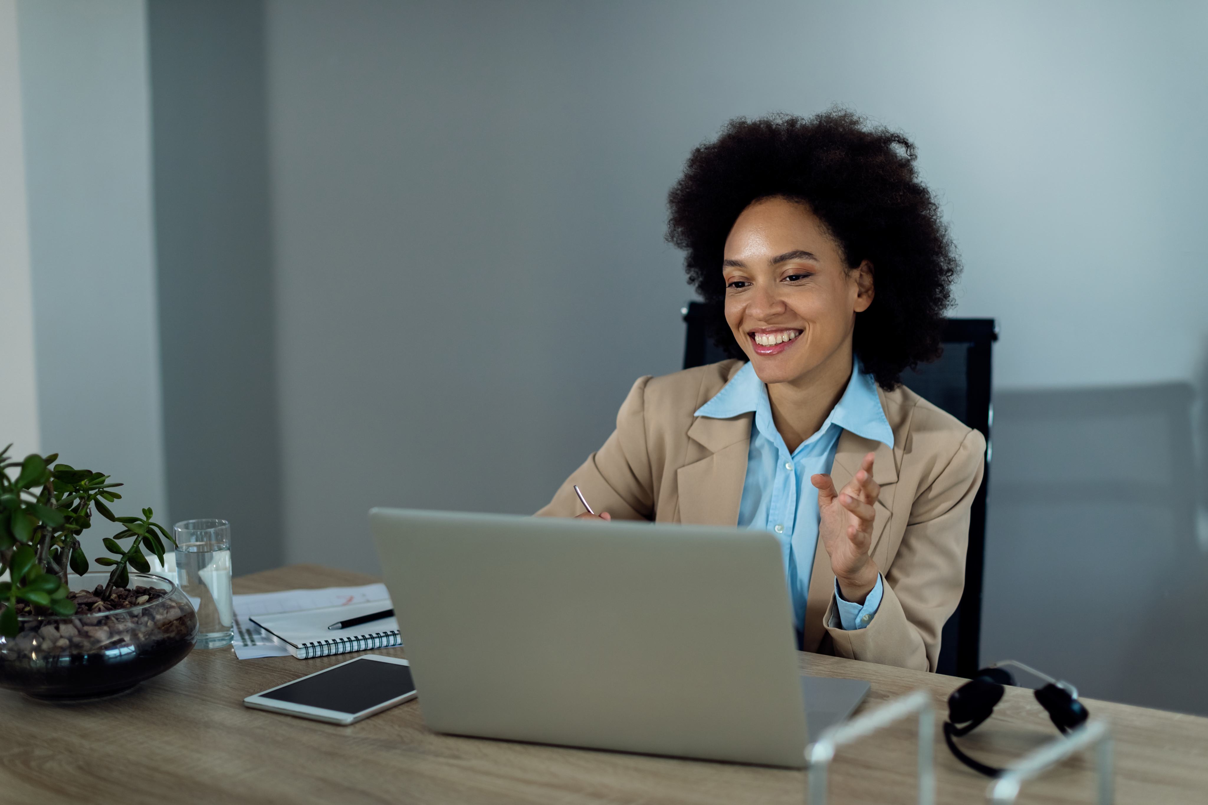 Professional working remotely with a laptop